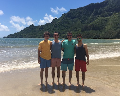 Matt and boys on beach in Hawaii